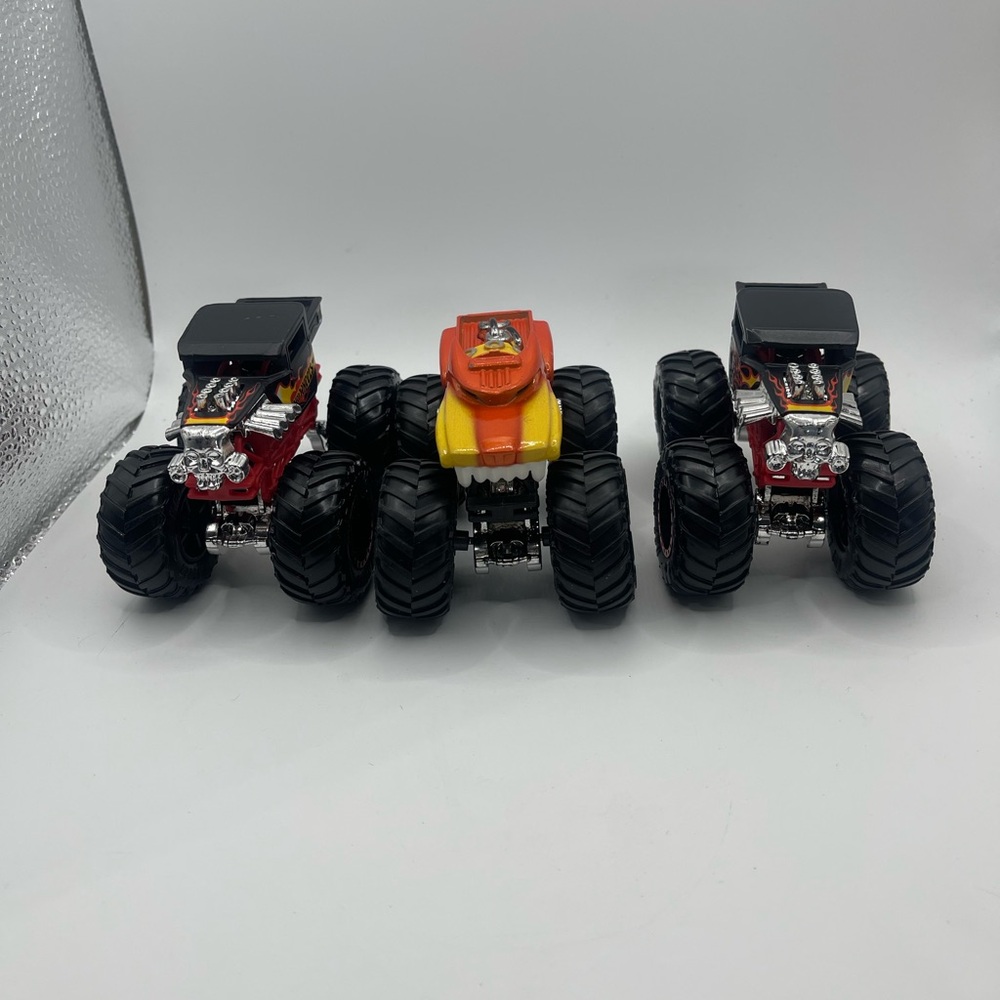 Thrilling Monster Truck Trio - Red, Yellow, Black